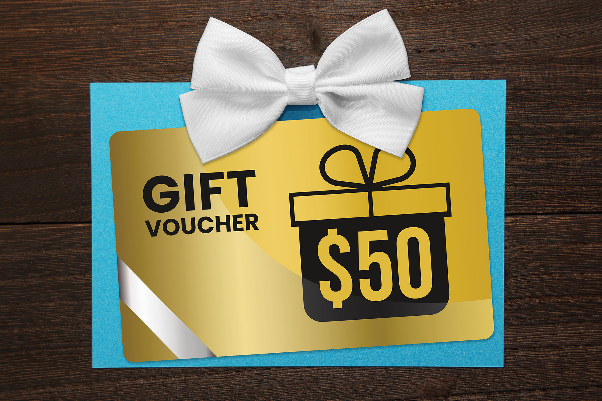 aerial image of laptop, coffee, pens and paper