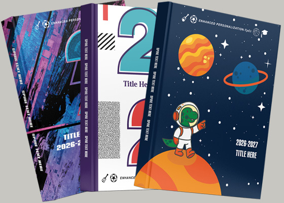 four yearbooks covers stacked loosely